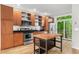 Modern kitchen features stainless steel appliances, wood cabinetry, and a butcher block island at 1271 Ponti Nw Mews # 92, Atlanta, GA 30318