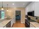 Well-equipped kitchen featuring granite countertops, stainless steel appliances, and ample cabinet space at 1605 Little Lisa Ln, Snellville, GA 30078