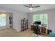 Bright office space with natural light, a desk, and built-in shelving at 1605 Little Lisa Ln, Snellville, GA 30078