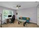 Bright office space featuring a desk, love seat and natural light at 1605 Little Lisa Ln, Snellville, GA 30078