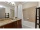 Well-maintained bathroom featuring a shower-tub combination and granite countertops at 390 17Th Nw St # 4055, Atlanta, GA 30363