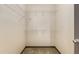 Walk-in closet with wall mounted racks for easy organization and tidy storage for clothing and accessories at 390 17Th Nw St # 4055, Atlanta, GA 30363
