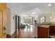 Bright and airy living room with hardwood floors, open floor plan, and access to a balcony at 390 17Th Nw St # 4055, Atlanta, GA 30363