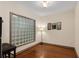 Office with hardwood floors, natural light from a window, and traditional decor at 390 17Th Nw St # 4055, Atlanta, GA 30363