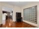 Home office featuring a unique glass block window for natural light and hardwood floors at 390 17Th Nw St # 4055, Atlanta, GA 30363
