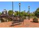 Beautiful community area with decorative bridge, park benches, lights and brick pavers near the building at 390 17Th Nw St # 4055, Atlanta, GA 30363