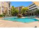 Resort-style pool with lounge chairs and lush landscaping, perfect for relaxation and outdoor enjoyment at 390 17Th Nw St # 4055, Atlanta, GA 30363