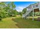 Well-maintained backyard with green grass and an exit to the porch at 4807 Willowwood Ne Dr, Kennesaw, GA 30144