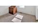 Carpeted bedroom with natural light and neutral walls at 4807 Willowwood Ne Dr, Kennesaw, GA 30144
