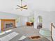 Spacious living room featuring vaulted ceilings, a fireplace, and large windows for ample natural light at 4807 Willowwood Ne Dr, Kennesaw, GA 30144