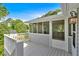Home exterior features a screened-in porch with white railings at 4807 Willowwood Ne Dr, Kennesaw, GA 30144
