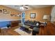 Comfortable living room with wainscotting, hardwood floors, and a stylish rug at 112 Hilltop Dr, Newborn, GA 30056