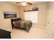Cozy bedroom features a ceiling fan and a window providing natural light at 116 Festoon Ct, Smyrna, GA 30080