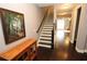 Bright foyer with hardwood floors and staircase leading to the upper level at 116 Festoon Ct, Smyrna, GA 30080