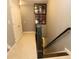 Upstairs hallway with carpeted floor, stairway, and unique wall decor at 116 Festoon Ct, Smyrna, GA 30080