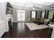 Inviting living room with hardwood floors, fireplace, and coffered ceilings at 116 Festoon Ct, Smyrna, GA 30080