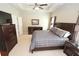 Comfortable main bedroom with ample closet space and a contemporary ceiling fan at 116 Festoon Ct, Smyrna, GA 30080