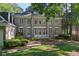 Spacious backyard featuring a well-maintained lawn and lush landscaping at 181 Sentinel Pl, Marietta, GA 30067