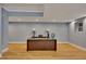Finished basement features office area with hardwood floors and a large window at 181 Sentinel Pl, Marietta, GA 30067