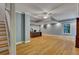Finished basement featuring hardwood floors, neutral walls, and staircase access at 181 Sentinel Pl, Marietta, GA 30067