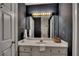 Bathroom with a large mirror, vanity, and shower at 181 Sentinel Pl, Marietta, GA 30067