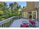 Deck overlooking lush greenery featuring comfortable seating, perfect for enjoying the outdoors and scenic views at 181 Sentinel Pl, Marietta, GA 30067