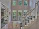 Grand two-story foyer featuring a staircase and tile flooring at 181 Sentinel Pl, Marietta, GA 30067