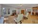 Open-concept living room with hardwood floors and seamless transitions to the kitchen and other living spaces at 181 Sentinel Pl, Marietta, GA 30067