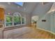 Bright living room boasts hardwood floors, large windows, and access to an outdoor deck at 181 Sentinel Pl, Marietta, GA 30067