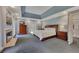 Spacious main bedroom with fireplace, tray ceilings, and neutral carpet at 181 Sentinel Pl, Marietta, GA 30067