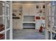 Bright office space with built-in bookshelves and cabinets, perfect for a home office or study at 181 Sentinel Pl, Marietta, GA 30067