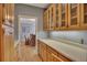 Spacious pantry with ample counter space, cabinets, and view into the dining room at 181 Sentinel Pl, Marietta, GA 30067