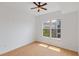 Bright bedroom with a ceiling fan, natural light, and neutral walls at 390 17Th Nw St # 6036, Atlanta, GA 30363