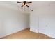 Bedroom featuring a ceiling fan, attractive laminate floors, and bright natural light at 390 17Th Nw St # 6036, Atlanta, GA 30363