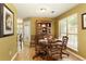 Cozy dining area with natural light and hardwood floors at 5850 Shannon Dr, Cumming, GA 30040