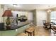 Eat in kitchen with black countertops and stainless steel appliances at 5850 Shannon Dr, Cumming, GA 30040