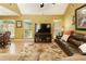 Spacious living room with hardwood floors, natural light, and comfortable seating at 5850 Shannon Dr, Cumming, GA 30040