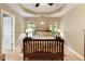 Beautiful main bedroom with wood floors, large windows, and neutral tones at 5850 Shannon Dr, Cumming, GA 30040