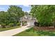 Beautiful two-story house featuring a well-maintained lawn and a spacious driveway at 84 Conner Glenn Dr, Hiram, GA 30141