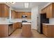 Modern kitchen featuring wood cabinets, stainless steel appliances, and quartz countertops at 84 Conner Glenn Dr, Hiram, GA 30141