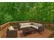 A beautiful outdoor seating area in the trees. Perfect for entertaining! at 84 Conner Glenn Dr, Hiram, GA 30141
