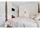Bedroom featuring a four-poster bed, soft carpet, and neutral color scheme at 1061 Towne Mill Xing, Canton, GA 30114