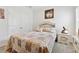 Comfortable bedroom with a soft carpet, a pretty quilt, and natural light through window at 1061 Towne Mill Xing, Canton, GA 30114
