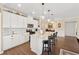 Modern kitchen with stainless steel appliances, granite countertops, and a breakfast bar at 1061 Towne Mill Xing, Canton, GA 30114