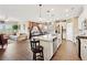 A gourmet kitchen with stainless steel appliances, a granite island, and a breakfast bar at 1061 Towne Mill Xing, Canton, GA 30114