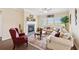 Comfortable living room with a fireplace, plush seating, and plenty of natural light at 1061 Towne Mill Xing, Canton, GA 30114