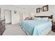 Spacious main bedroom with tray ceiling, neutral carpet, and ensuite bathroom at 1061 Towne Mill Xing, Canton, GA 30114
