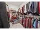 Spacious walk-in closet with organized storage and ample hanging space for clothing at 1061 Towne Mill Xing, Canton, GA 30114