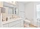 Bathroom features a modern vanity with ample counter space and a toilet at 1646 Highway 92 N, Fayetteville, GA 30214