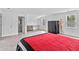 Bright room featuring a bed, mannequin, and modern flooring at 1646 Highway 92 N, Fayetteville, GA 30214